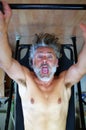 Inversion table gym man Royalty Free Stock Photo