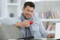 mature man using laptop on desk at home Royalty Free Stock Photo