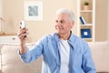 Mature man using video chat on mobile phone Royalty Free Stock Photo