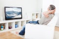 Mature man watching tv Royalty Free Stock Photo