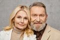 A mature man and woman, dressed Royalty Free Stock Photo