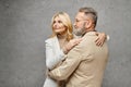 A mature man and woman, dressed Royalty Free Stock Photo