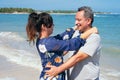 Married Couple Hugging Each Other Standing At The Beach Royalty Free Stock Photo