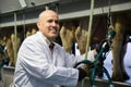 Milker working with milking machines livestock barn