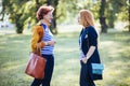 Mature mother and adult daughter enjoying in the park Royalty Free Stock Photo