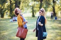 Mature mother and adult daughter enjoying in the park Royalty Free Stock Photo