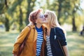 Mature mother and adult daughter enjoying a day in the park Royalty Free Stock Photo