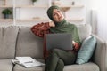 Mature Muslim Businesswoman Touching Neck Having Pain Using Laptop Indoor Royalty Free Stock Photo