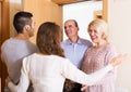 Mature people coming to visit adult kids Royalty Free Stock Photo