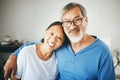 Mature, portrait or happy couple hug in home or house together to relax on holiday with bond or support. Embrace, lovers Royalty Free Stock Photo