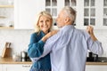 Mature Romance. Happy Senior Couple Embracing And Dancing At Home Royalty Free Stock Photo