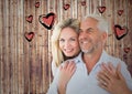 Mature romantic couple and heart graphic