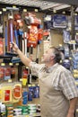 Mature salesperson working in hardware store