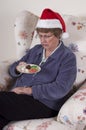 Mature Senior Woman Eating Holidays Cookies, Snack