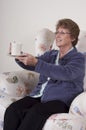 Mature Senior Woman Entertaining Drinking Coffee