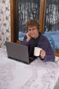 Mature Senior Woman using Laptop Computer