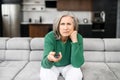 Mature senior woman watching a TV Royalty Free Stock Photo