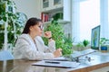 Mature serious business woman working at computer, workplace boss entrepreneur Royalty Free Stock Photo