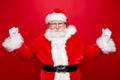 Mature serious masculine grandfather stylish Santa with white gl