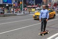 Mature skateboarder in central Manhattan