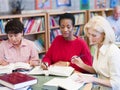 Mature students studying in library Royalty Free Stock Photo