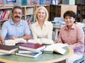 Mature students studying in library Royalty Free Stock Photo