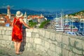 Mature tourist woman enjoying the view from the castle, Trogir Royalty Free Stock Photo