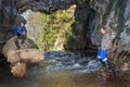 Mature tourists-cavers explore the grotto in the atysh karst cave