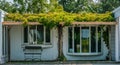 Mature vine growth canopies on trellis over entrance to builiding