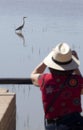 Mature woman birdwatching