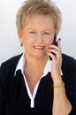 Mature woman on cell phone Royalty Free Stock Photo