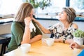 Mature woman comforting her friend after breakup Royalty Free Stock Photo