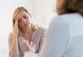 Mature Woman Discussing Problems With Counselor Royalty Free Stock Photo