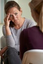 Mature Woman Discussing Problems With Counselor Royalty Free Stock Photo