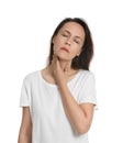 Mature woman doing thyroid self examination