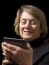 Mature Woman With E-Reader