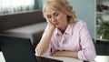 Mature woman falling asleep at workplace, lack of vitamins and energy, tired Royalty Free Stock Photo