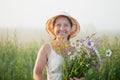 Mature woman with flowers posy