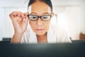 Mature woman, glasses and reading on computer for home blog or article on eye care, health and lens sale or discount Royalty Free Stock Photo