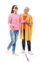 Mature woman helping blind person with long cane