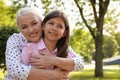 Mature woman with her little granddaughter in park Royalty Free Stock Photo