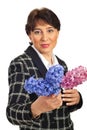 Mature woman holding hyacinth Royalty Free Stock Photo