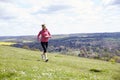 Mature Woman Jogging In Countryside Royalty Free Stock Photo