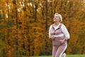 Mature woman jogging. Active lifestyle Royalty Free Stock Photo