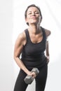 Mature woman lifting weights