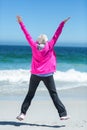 Mature woman outstretching her arms Royalty Free Stock Photo