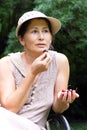 Mature woman in the park. Royalty Free Stock Photo