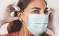 Mature woman portrait wearing surgical face mask and gloves - People self quarantine for preventing and stop corona virus
