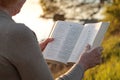 Mature woman reading bible