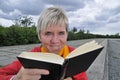 Mature woman reading book Royalty Free Stock Photo